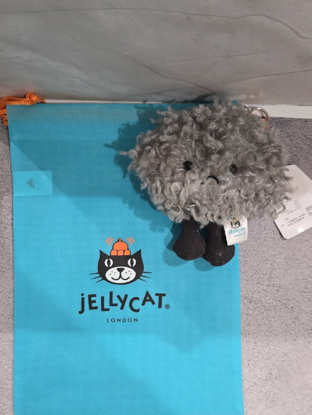 Jellycat Gray Curly Plush Bag Charm with Black Legs
